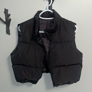 Cropped black puffer vest